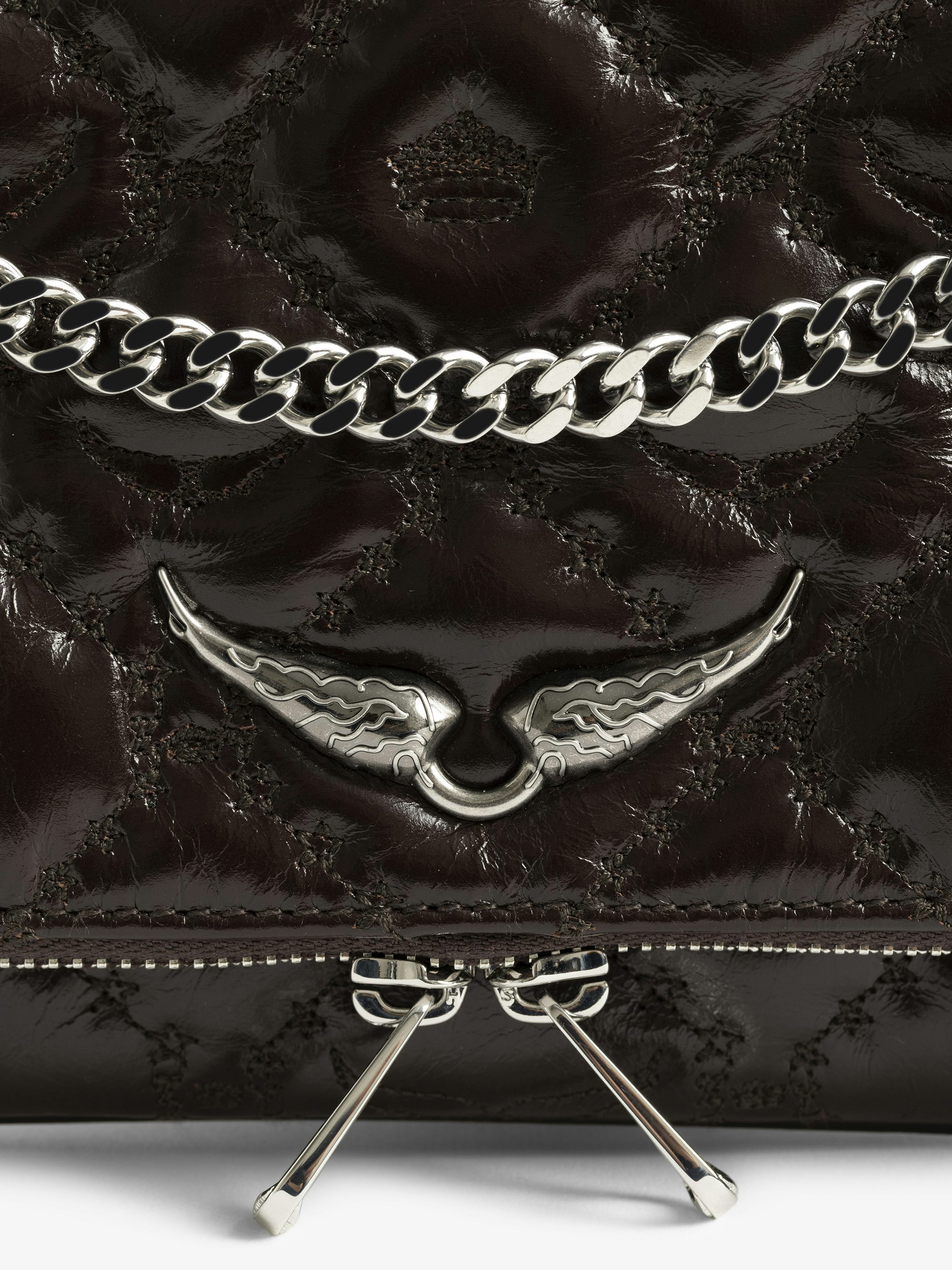 Rock II Vintage Monogram Clutch - Clutch in vintage quilted effect leather with sliding metal chain and signature wings.